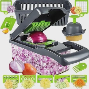 May include: A dark gray vegetable chopper with a clear collection container filled with diced red onion. The set includes a hinged lid, a green grid blade, a gray potato press, and various interchangeable stainless steel blades for slicing.