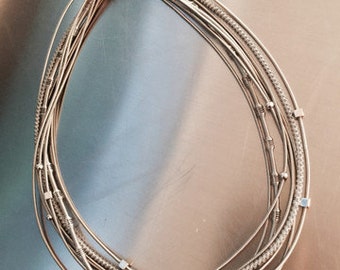 Gorgeous Mixed texture Silver Colored Piano Wire Necklace