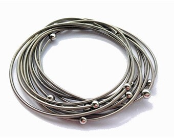 Piano Wire Bracelet Silver with silver beads