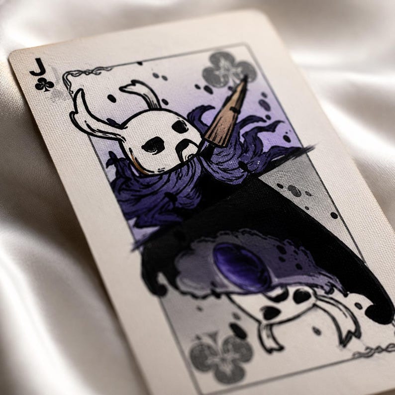 Close up fantasy jack card with detailed purple cloak character art and premium textured playing card finish