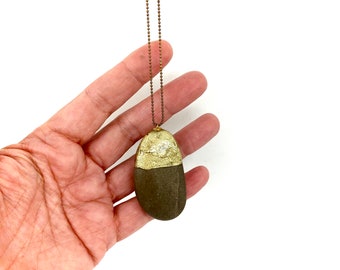 Pebble and gold resin necklace. Long necklace Modern jewelry. Contemporary organic Metal and stone pendant.