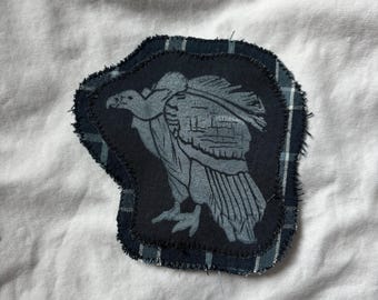 Stampa a blocchi con linoleografia raffigurante un avvoltoio