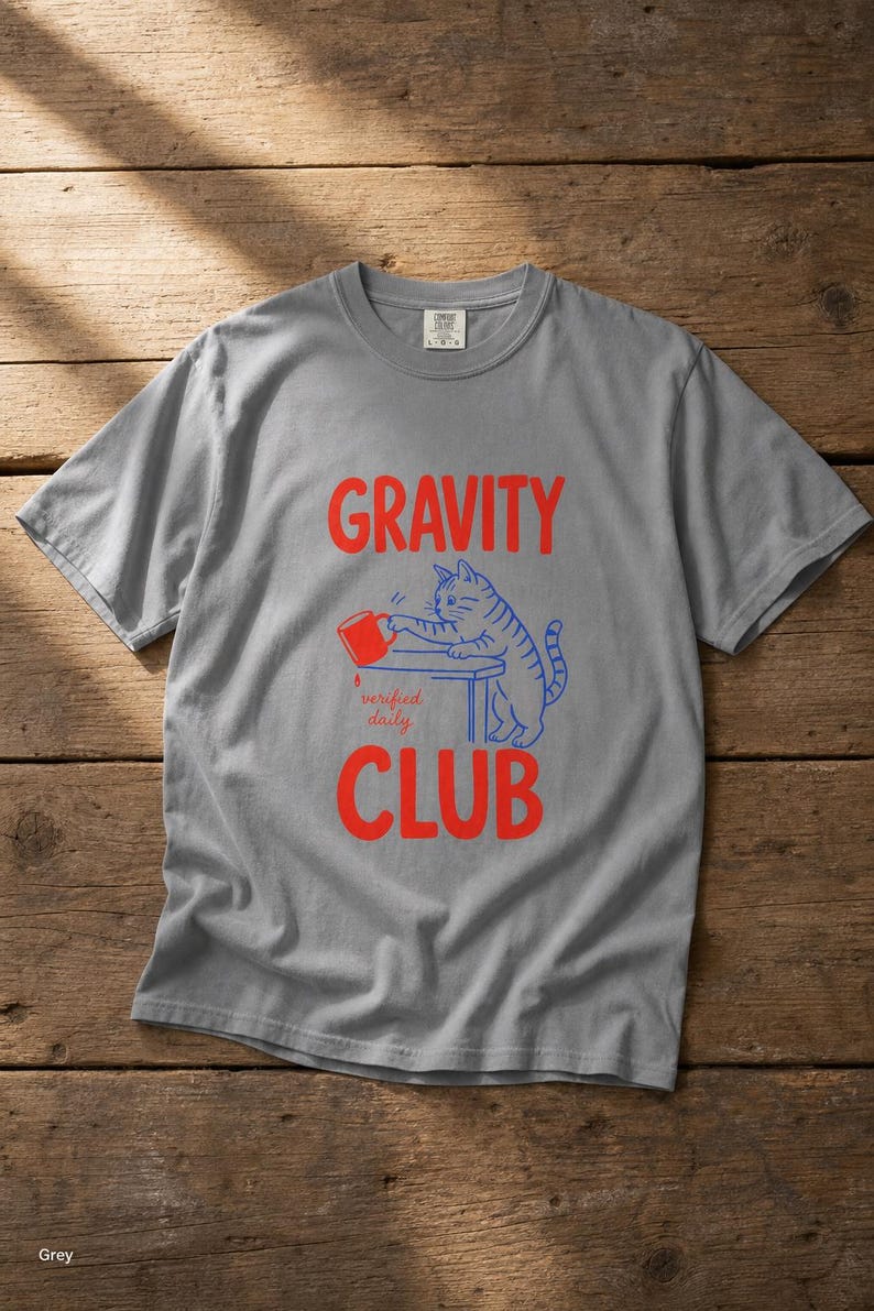 Gravity Club Cat T-Shirt Funny Cat Knocking Coffee Mug Off Table Tee Two Color Cat Lover Graphic Tee Gift imagem 13