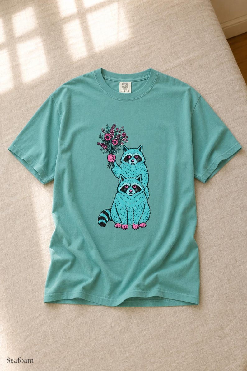 Two Raccoons Holding Wildflowers T-Shirt, Teal and Pink Riso Style Raccoon Tee, Cottagecore Animal Graphic Shirt, Soft Protest Gift image 9