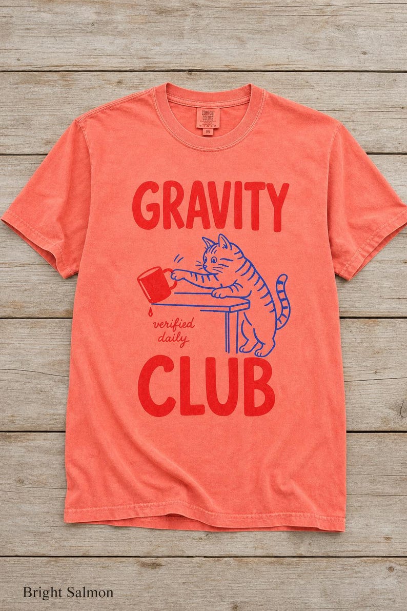 Gravity Club Cat T-Shirt Funny Cat Knocking Coffee Mug Off Table Tee Two Color Cat Lover Graphic Tee Gift imagem 10