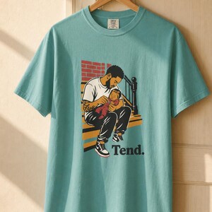 Tend Father and Baby Brownstone Stoop T-Shirt Bold Comic Illustration Fatherhood Graphic Tee Black Dad Gift 画像 10