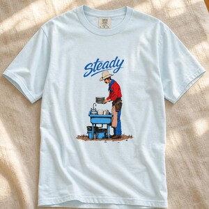 Steady Cowboy Washing Dishes T-Shirt, Mustached Ranch Hand at Blue Sink Graphic Tee, Quiet Work Western Shirt image 9