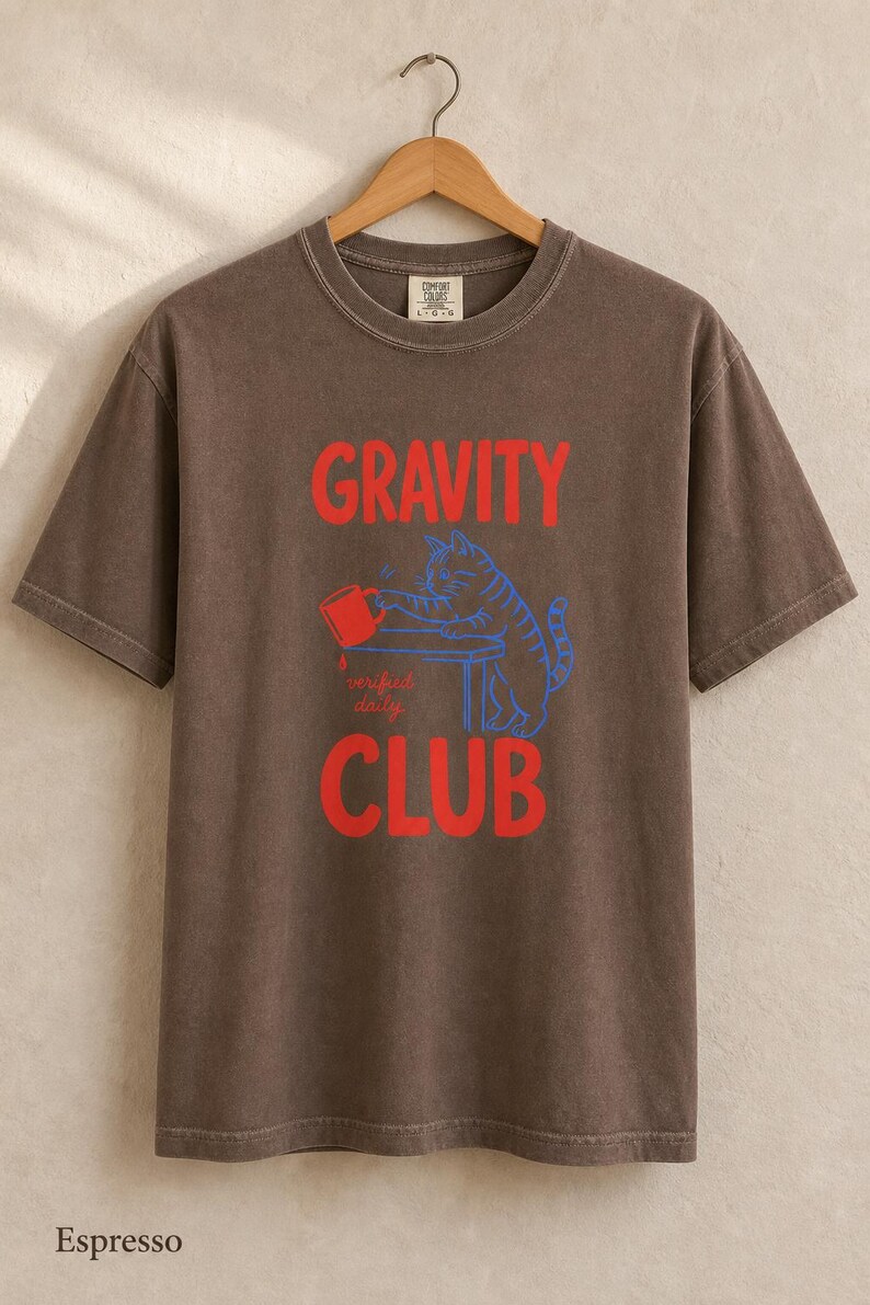 Gravity Club Cat T-Shirt Funny Cat Knocking Coffee Mug Off Table Tee Two Color Cat Lover Graphic Tee Gift imagem 17
