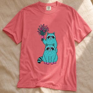 Two Raccoons Holding Wildflowers T-Shirt, Teal and Pink Riso Style Raccoon Tee, Cottagecore Animal Graphic Shirt, Soft Protest Gift image 15