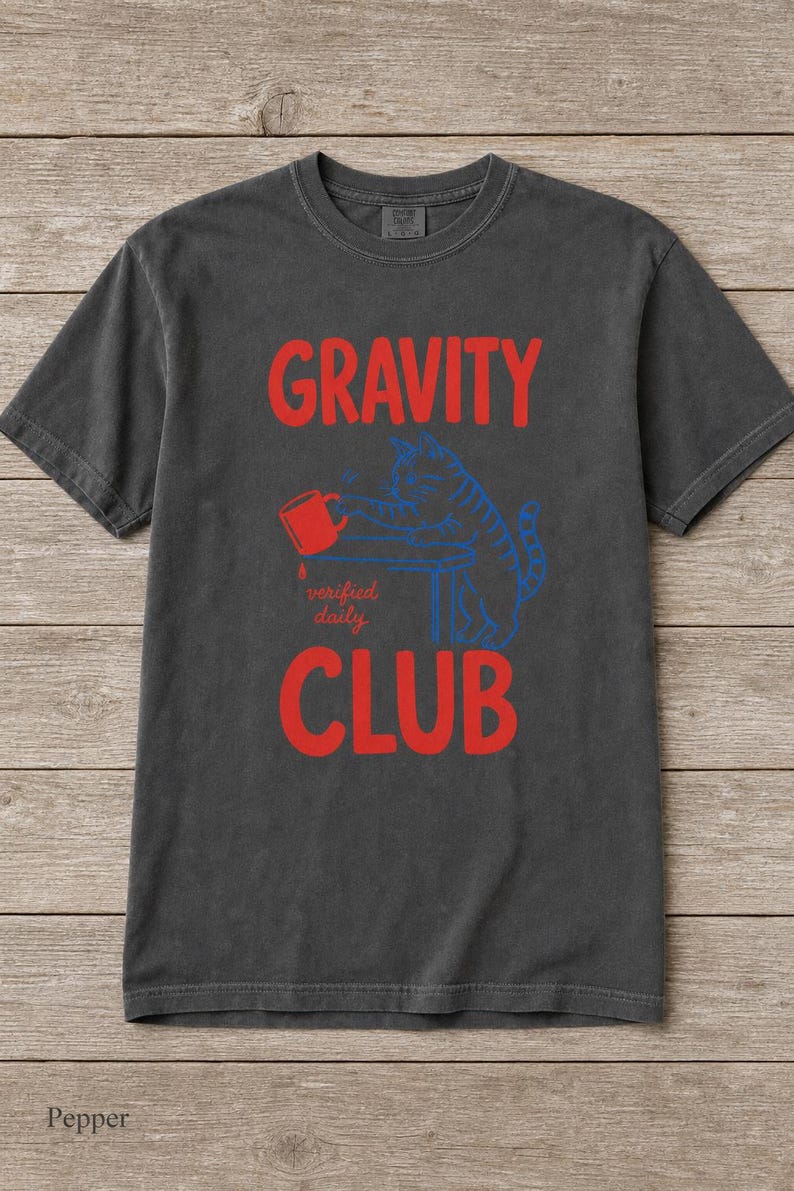 Gravity Club Cat T-Shirt Funny Cat Knocking Coffee Mug Off Table Tee Two Color Cat Lover Graphic Tee Gift imagem 12