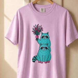 Two Raccoons Holding Wildflowers T-Shirt, Teal and Pink Riso Style Raccoon Tee, Cottagecore Animal Graphic Shirt, Soft Protest Gift image 18