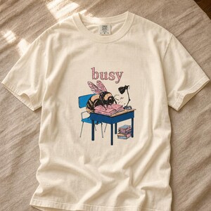Busy Bee at Desk T-Shirt, Bumblebee Studying Illustration Tee, Bookish Cottagecore Graphic Shirt, Hard Worker Gift image 1
