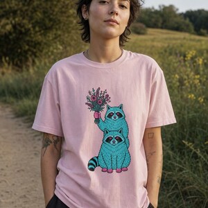 Two Raccoons Holding Wildflowers T-Shirt, Teal and Pink Riso Style Raccoon Tee, Cottagecore Animal Graphic Shirt, Soft Protest Gift image 3