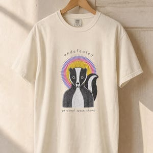 Undefeated Personal Space Champ Skunk T-Shirt, Funny Introvert Tee, Stippled Skunk Portrait with Sunburst Halo Graphic Tee Bild 6
