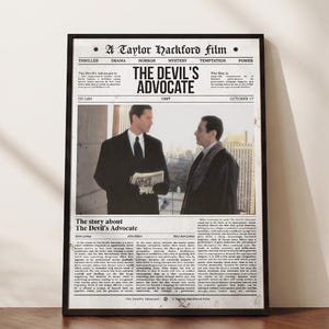 May include: A framed poster featuring a newspaper-style layout for the 1997 film The Devil's Advocate. The design includes the title, a film still of two men in suits, and columns of text detailing the plot, cast, and production information.