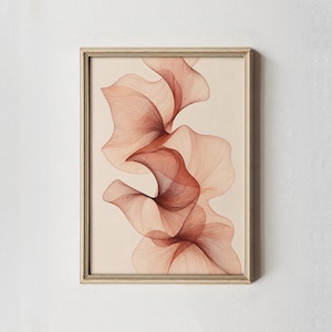 May include: A framed wall art print featuring an abstract design of flowing, layered, rust-coloured lines that create organic, petal-like shapes against a light cream background. The artwork is enclosed in a simple, light-toned wooden frame.