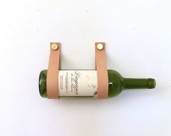 Wine Straps leather and brass wall mount wine holder and magazine rack