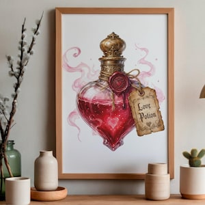 May include: A framed art print featuring a heart-shaped glass bottle filled with a vibrant red liquid. The bottle has an ornate gold stopper, a red wax seal with a heart emblem, and a beige parchment tag with the text Love Potion written on it.
