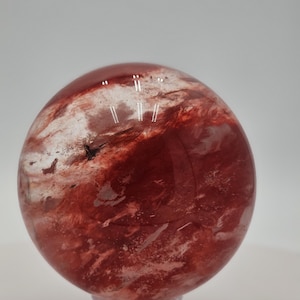 Red Smelting Quartz Sphere – Polished Crystal 9.8 cm