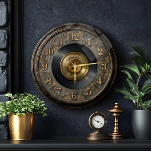 May include: A round wall clock featuring a black vinyl record face with gold-colored numerals and ornate filigree detailing. The center has a brass-toned circular plate with thin gold hands. The clock is encased in a dark, circular frame.