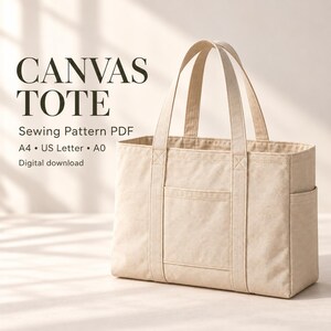 May include: A beige canvas tote bag with two top handles, a front pocket, and side pockets. The text reads: CANVAS TOTE, Sewing Pattern PDF, A4, US Letter, A0, Digital download. The bag features reinforced stitching on the handles.