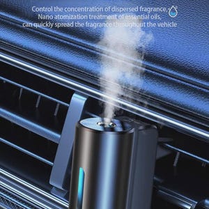 May include: A black and blue car air freshener with the text "THIRD GEAR ADJUSTMENT". The device is emitting a vapor and has a blue light. The text on the image says it controls the concentration of dispersed fragrance.