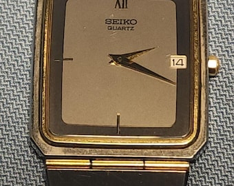 Zabytkowy zegarek Seiko Tank z lat 80. – ośmiokątny, dwukolorowy, złoto i srebro – prezent dla niego – grawerowany mechanizm kwarcowy Seiko 9029-5009 z 1983 r.