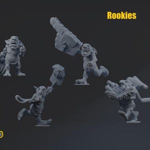 May include: A set of four grey miniature goblin figures labeled Rookies. One goblin holds a large foam finger, another holds a whistle and cap, one carries a bundle of hot dogs, and the fourth stands with a shield. The figures are unpainted.