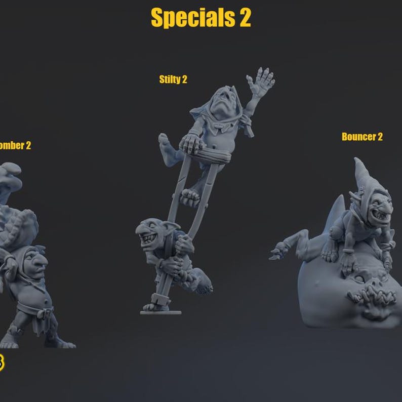 May include: Three gray miniature fantasy figures labeled Specials 2. One figure is on stilts, one carries a load, and one sits on a creature. Text labels include Bomber 2, Stilty 2, and Bouncer 2. These unpainted resin gaming figurines feature detailed goblin-like characters in dynamic poses.