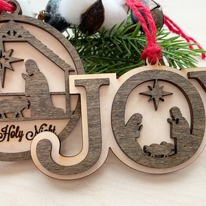 Engraved wood Nativity ornaments