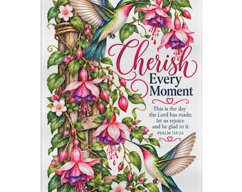 May include: A rectangular decorative wall hanging featuring two hummingbirds, vibrant pink fuchsia flowers, and green leaves climbing a wooden trellis. The text reads: Cherish Every Moment, This is the day the Lord has made; let us rejoice and be glad in it. PSALM 118:24.