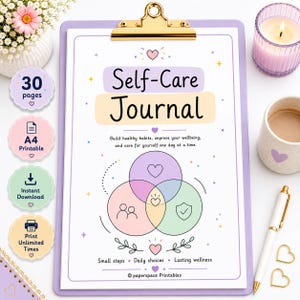 May include: A lavender clipboard holding a Self-Care Journal page with text, a Venn diagram featuring heart, person, and shield icons, and the phrases Build healthy habits, improve your wellbeing, and care for yourself one day at a time.