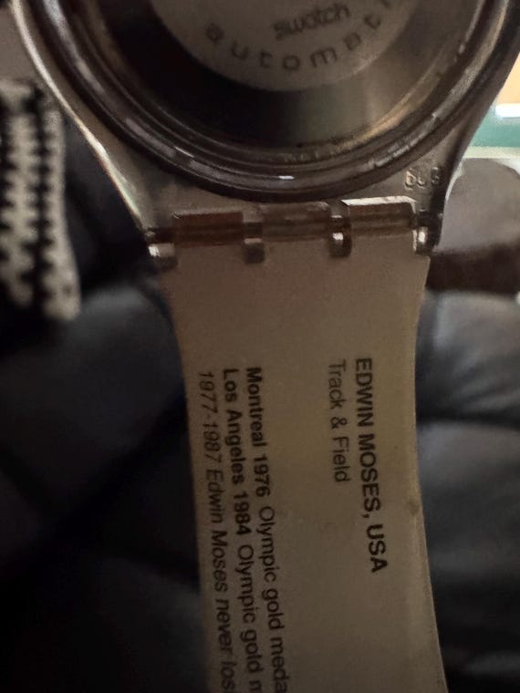 Swatch watch. Edwin Moses.  Automatic ,no batteries ever. Dude running View 4