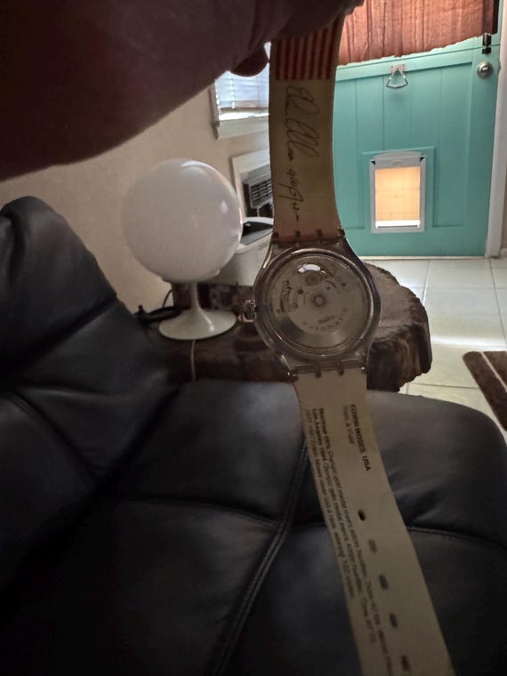 Swatch watch. Edwin Moses.  Automatic ,no batteries ever. Dude running View 6