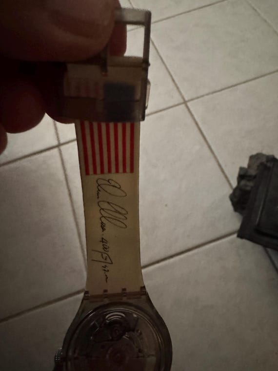 Swatch watch. Edwin Moses.  Automatic ,no batteries ever. Dude running View 3