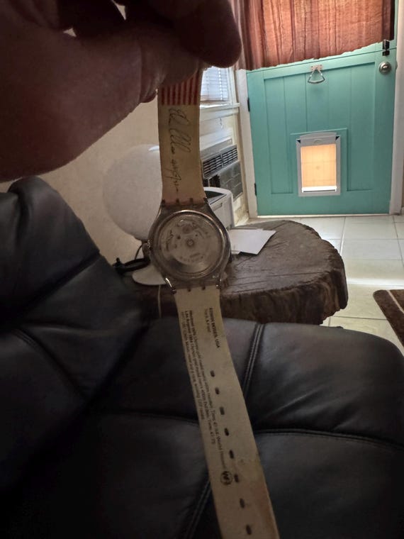 Swatch watch. Edwin Moses.  Automatic ,no batteries ever. Dude running View 5