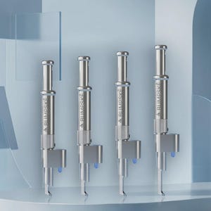 May include: Four identical silver-toned metal tools arranged in a row, each featuring a cylindrical body with the text BUMPSKE printed vertically, a knurled grip section, a protruding side component, and a small blue light element at the base.