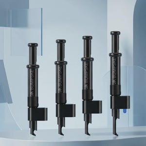 May include: Four black cylindrical tools arranged in a row, each featuring a plunger mechanism at the top and a specialized hook-shaped nozzle at the base. The word BUMPSKE is printed in white text on the side of each black tool body.
