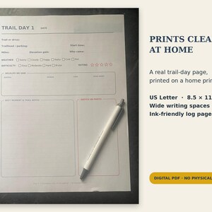 May include: A white US Letter 8.5 x 11 inch trail log sheet with black text and lines, featuring sections for trail details, weather, difficulty, wildlife, and notes. A white pen with a grey tip rests diagonally across the paper surface.