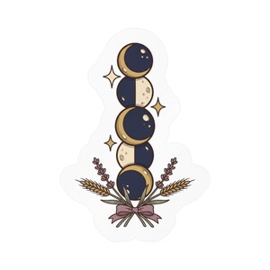 May include: A vertical stack of five circular moon phases in dark blue and cream, accented by four-pointed gold stars. At the base, a bouquet of lavender sprigs and wheat stalks is tied together with a simple, muted purple ribbon bow.