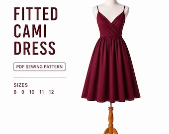 May include: A burgundy cami dress on a wooden dress form. The dress has a V-neckline and spaghetti straps. The text on the image reads "Fitted Cami Dress" and "PDF Sewing Pattern". Sizes 8, 9, 10, 11, and 12 are listed.