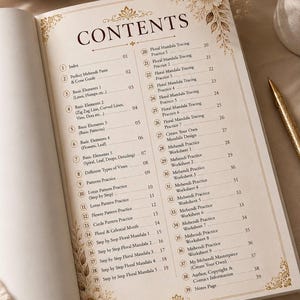 May include: Open book with a detailed contents page. The page features a decorative floral border and a list of topics, including mandala tracing, basic elements, and practice worksheets. A gold pen rests on the right side.