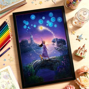 May include: A framed rectangular print featuring a digital illustration of a person in a purple dress standing on a rock formation with a small animal, reaching toward a glowing star in a night sky filled with blue orbs above a coastal castle.
