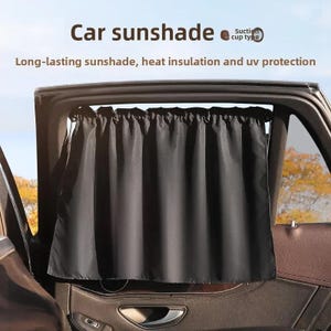 May include: Black car sunshade installed on a car window. The text on the image reads "Car sunshade" and "Long-lasting sunshade, heat insulation and uv protection". The sunshade is a suction cup type.