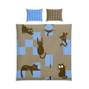 May include: A bedding set consisting of a large rectangular comforter and two smaller rectangular pillows. The comforter features a brown and light blue wavy line pattern with dark brown cat silhouettes. One pillow is blue-checked, one is brown-checked.