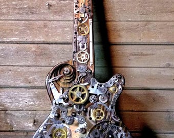 ギター。スチームパンク エレキギター。スチームパンク彫刻