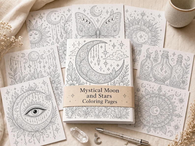 May include: A collection of mystical coloring pages featuring celestial designs. The central book, titled "Mystical Moon and Stars Coloring Pages," is surrounded by individual pages with moons, stars, crystals, and a butterfly. A pen, crystal, and a mug are also present.