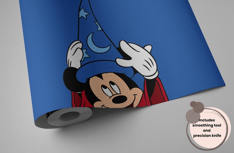 May include: A roll of blue wallpaper featuring a graphic of Mickey Mouse wearing a blue wizard hat with moon and star patterns and a red robe. The wallpaper includes a smoothing tool and a precision knife for application purposes.