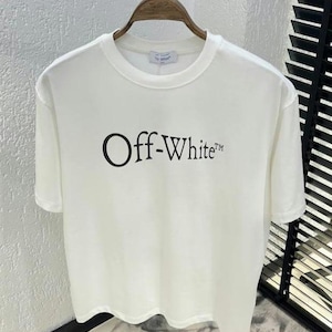Off-White Run Arrow Skate Logo Weißes Grafik-T-Shirt: Baumwolljersey, Herren Sommer Freizeitkleidung