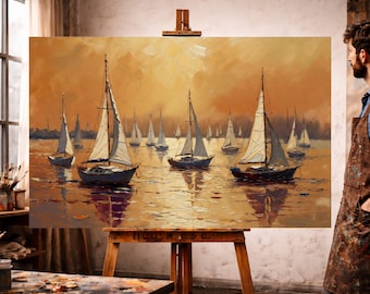 May include: An oil painting of sailboats on the water, with a warm, golden-orange sky. The boats have white sails and dark hulls, reflecting in the water. The artwork is displayed on a wooden easel.